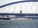 Members of Australia's men's rowing team train at the Sea Forest Waterway ahead of the Olympic Games in Tokyo on July 18. While the opening ceremony for the 2020 Tokyo Olympics is slated for July 23, a recent survey published by the Asahi newspaper says that two-thirds of people in Japan do not believe the country can host a safe and secure Olympics amid a fresh wave of coronavirus infections, Reuters reported.(Behrouz Mehri / AFP)