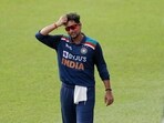 Kuldeep Yadav scratches his head while fielding on the first one-day international cricket match between Sri Lanka and India in Colombo.(AP)