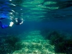 Cyprus Antiquities Department official Yiannis Violaris snorkels over submerged stone remains of the ancient harbor next of Amathus ancient city, in the eastern Mediterranean island of Cyprus, on Thursday, July 1, 2021. Lying just a few feet underwater a mere 200 feet off the coastline near the resort town of Limassol, this 2,400 year-old harbor said to be built Alexander the Great's successors will soon be Cyprus' newest tourist attraction where adventurous holidaymakers could snorkel over its submerged stone remains.(AP Photo/Petros Karadjias) Cyprus Antiquities Department official Yiannis Violaris snorkels over submerged stone remains of the ancient harbor next of Amathus ancient city, in the eastern Mediterranean island of Cyprus, on Thursday, July 1, 2021. Lying just a few feet underwater a mere 200 feet off the coastline near the resort town of Limassol, this 2,400 year-old harbor said to be built Alexander the Great's successors will soon be Cyprus' newest tourist attraction where adventurous holidaymakers could snorkel over its submerged stone remains.(AP Photo/Petros Karadjias)