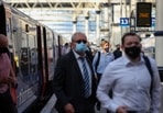 The Spanish government lifted the mandate to wear masks outdoors from June 26 onwards, however, individuals still have to wear them on public transportation, including trains. (Hollie Adams/Bloomberg) The Spanish government lifted the mandate to wear masks outdoors from June 26 onwards, however, individuals still have to wear them on public transportation, including trains. (Hollie Adams/Bloomberg)