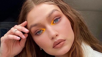Gigi posted the image of the model walking in a pair of skin tight light denims which she paired with a beige shirt that was tied like a crop top just under the bust. (Instagram) Gigi posted the image of the model walking in a pair of skin tight light denims which she paired with a beige shirt that was tied like a crop top just under the bust. (Instagram)
