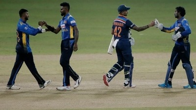 India's Shikhar Dhawan with Sri Lanka players after India won the match REUTERS/Dinuka Liyanawatte (REUTERS)