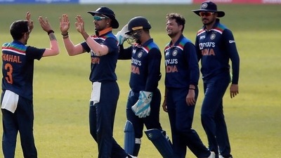 India's Shikhar Dhawan celebrates with teammates after taking a catch to dismiss Sri Lanka's Bhanuka Rajapaksa (REUTERS)