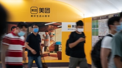 A Meituan advertisement inside a subway station in Beijing. (Bloomberg) A Meituan advertisement inside a subway station in Beijing. (Bloomberg)
