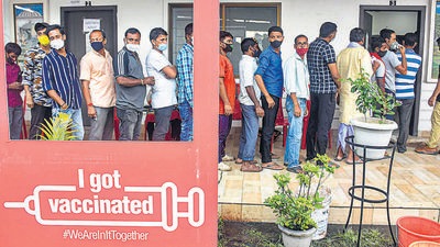 Beneficiaries wait in a queue to receive for Covid-19 vaccine dose, at a centrein Guwahati earlier this month. (PTI) Beneficiaries wait in a queue to receive for Covid-19 vaccine dose, at a centrein Guwahati earlier this month. (PTI)