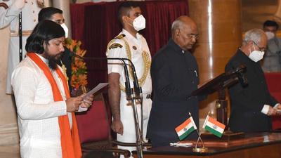 Nisith Pramanik takes oath as minister of state during the swearing-in ceremony at Rashtrapati Bhavan, in New Delhi on July 7, 2021. (HT Photo) Nisith Pramanik takes oath as minister of state during the swearing-in ceremony at Rashtrapati Bhavan, in New Delhi on July 7, 2021. (HT Photo)
