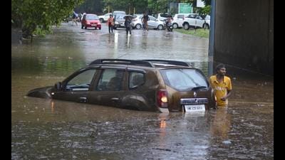 A submerged car due to the waterlogging caused by heavy rain at Industrial Area in Phase 2, Chandigarh, on Monday. (Keshav Singh/HT) A submerged car due to the waterlogging caused by heavy rain at Industrial Area in Phase 2, Chandigarh, on Monday. (Keshav Singh/HT)