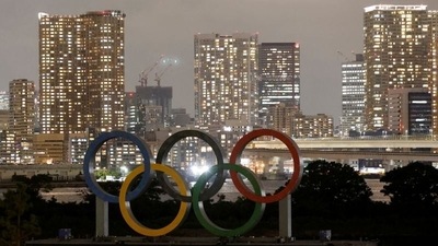The Olympic Rings installed on a floating platform are seen in front of the city skyline ahead of the 2020 Tokyo Olympic Games. (Fabrizio Bensch / REUTERS) The Olympic Rings installed on a floating platform are seen in front of the city skyline ahead of the 2020 Tokyo Olympic Games. (Fabrizio Bensch / REUTERS)