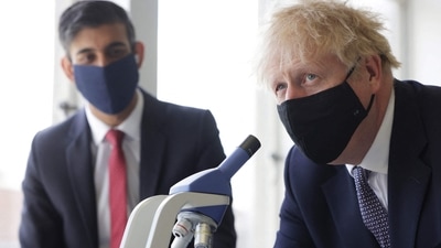 Boris Johnson and his minister Rishi Sunak had earlier announced that they will be taking part in a pilot project that will allow them to continue working from Downing Street (AFP) Boris Johnson and his minister Rishi Sunak had earlier announced that they will be taking part in a pilot project that will allow them to continue working from Downing Street (AFP)
