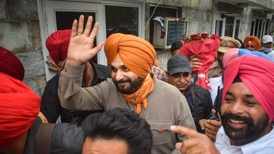 Newly elected Punjab Pradesh Congress Committee President Navjot Singh Sidhu leaves for Chandigarh from his residence in Patiala. (PTI Photo) Newly elected Punjab Pradesh Congress Committee President Navjot Singh Sidhu leaves for Chandigarh from his residence in Patiala. (PTI Photo)