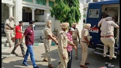 The accused in police custody. The accused in police custody.
