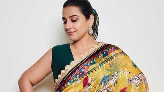 In the pictures, Vidya is seen effortlessly carrying the beautiful printed saree with a light lace embodied on it. To complete the look, she accessorised her outfit with gold and diamond earrings and a large ring and opted for minimal make-up so as to not take away from the sari.(Instagram)