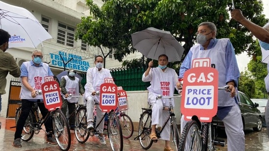 TMC MPs protested fuel price hike on the first day of monsoon session in the Parliament. (HT Photo)