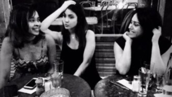 Anushka Sharma poses with her friends.