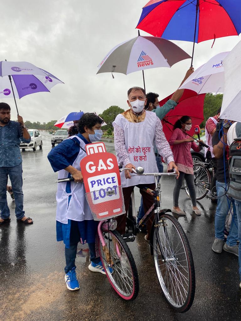 TMC MP's reach Parliament on a bicycle. The party is protesting fuel price hike. 