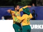 South Africa's Tabraiz Shamsi, left, celebrates with Temba Bavuma.(AP) South Africa's Tabraiz Shamsi, left, celebrates with Temba Bavuma.(AP)