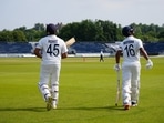 Rohit Sharma and Mayank Agarwal walk put to bat wearing black armbands(BCCI/Twitter) Rohit Sharma and Mayank Agarwal walk put to bat wearing black armbands(BCCI/Twitter)