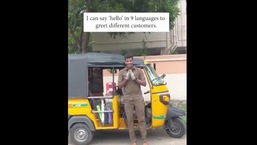 Anna Durai infront of his auto.