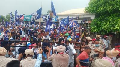 BSP workers protesting outside Bhagwant Mann’s residence in Sangrur on Tuesday. (HT Photo)
