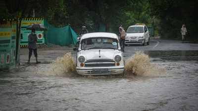 A vehicle wades through a waterlogged stretch at Pragati Maidan in New Delhi, on July 19. Delhi received 69.6mm of rain in 24 hours, a spell that led to the temperature dropping to 26.5 degrees Celsius, down from 36.4°C the previous day, and eight degrees below normal for this time of year, HT reported. (Sanchit Khanna / HT Photo) A vehicle wades through a waterlogged stretch at Pragati Maidan in New Delhi, on July 19. Delhi received 69.6mm of rain in 24 hours, a spell that led to the temperature dropping to 26.5 degrees Celsius, down from 36.4°C the previous day, and eight degrees below normal for this time of year, HT reported. (Sanchit Khanna / HT Photo)
