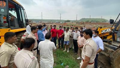 Officials faced resistance from locals at an illegal colony in Bhondsi.