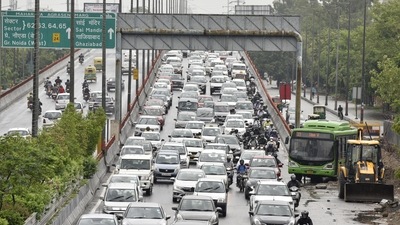 Traffic congestion in Noida, on July 19. According to IMD, Delhi will receive light to moderate rainfall accompanied by thunderstorms. Adjoining areas like Gurugram, Faridabad, Hindon Air Force Station, Noida, Ghaziabad and those in Haryana and Uttar Pradesh will also witness thunderstorms with light to moderate intensity rain on July 20. (Sunil Ghosh / HT Photo) Traffic congestion in Noida, on July 19. According to IMD, Delhi will receive light to moderate rainfall accompanied by thunderstorms. Adjoining areas like Gurugram, Faridabad, Hindon Air Force Station, Noida, Ghaziabad and those in Haryana and Uttar Pradesh will also witness thunderstorms with light to moderate intensity rain on July 20. (Sunil Ghosh / HT Photo)