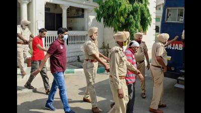 Three of the accused being taken back to jail after a court hearing in the sacrilege case in Faridkot in May. (HT file photo) Three of the accused being taken back to jail after a court hearing in the sacrilege case in Faridkot in May. (HT file photo)