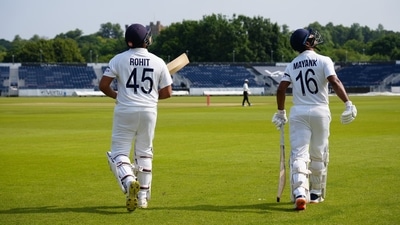 Rohit Sharma and Mayank Agarwal walk put to bat wearing black armbands (BCCI/Twitter) Rohit Sharma and Mayank Agarwal walk put to bat wearing black armbands (BCCI/Twitter)