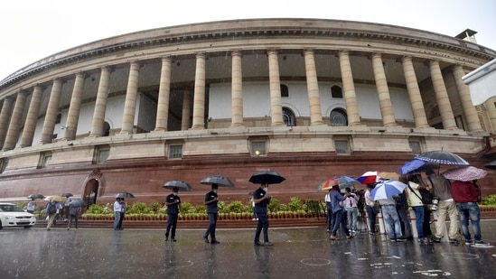 Holding umbrella by self, PM Modi addresses media in rain ahead of monsoon  session of parliament