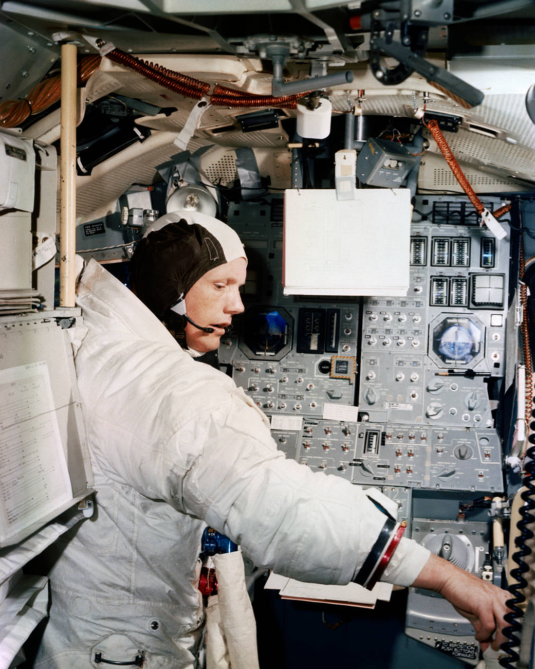 Neil Armstrong works within the module.  (NASA)