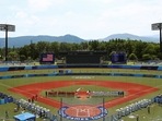 Softball action begins at Fukushima Azuma Baseball Stadium. 