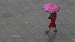 An initial orange category alert for July 21 and 22 was upgraded to red at 1pm by the IMD, indicating higher chances of severe weather events. (PTI) An initial orange category alert for July 21 and 22 was upgraded to red at 1pm by the IMD, indicating higher chances of severe weather events. (PTI)