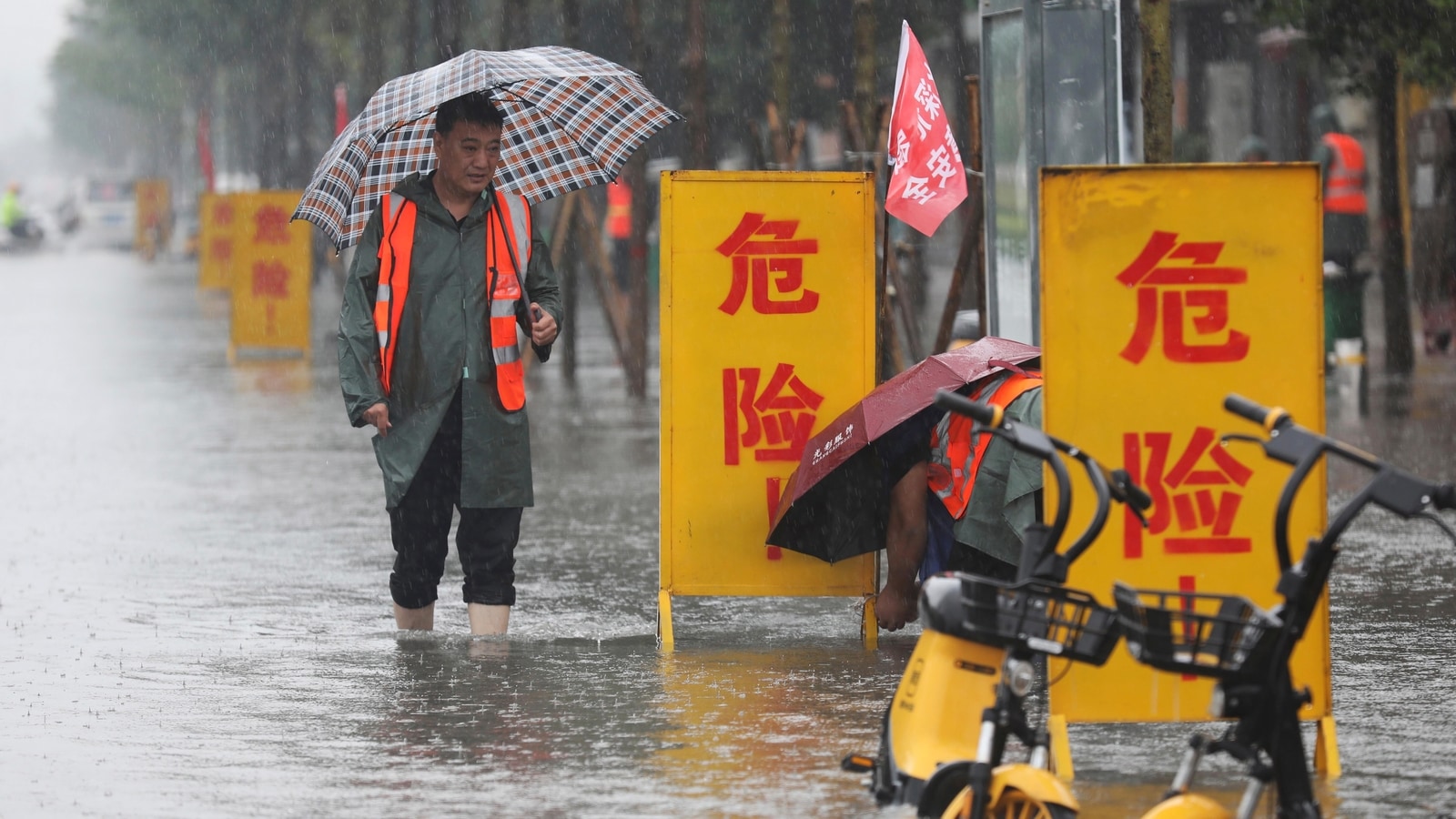 Photos: Thousands evacuated as deadly flooding hits central China