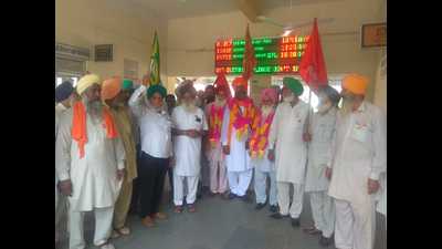 Farmers at the Dhuri railway station before leaving for Delhi.