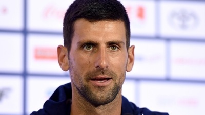 Tennis player Novak Djokovic speaks to the media before traveling to Japan where he will represent Serbia at the Tokyo 2020 Olympics, in Belgrade, Serbia, (REUTERS)