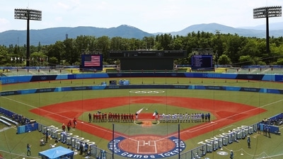 Softball action begins at Fukushima Azuma Baseball Stadium. (REUTERS)
