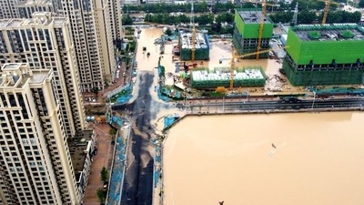An aerial view shows the flooded areas following heavy rainfall in Zhengzhou, Henan province, China via REUTERS (VIA REUTERS)