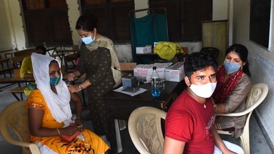 A person being inoculated against Covid-19 at a school in Shivaji Nagar, Gurugram, India, on Tuesday, July 20, 2021. (Photo by Vipin Kumar/ Hindustan Times)