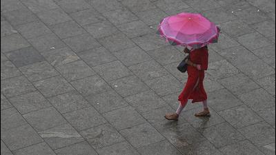 An initial orange category alert for July 21 and 22 was upgraded to red at 1pm by the IMD, indicating higher chances of severe weather events. (PTI) An initial orange category alert for July 21 and 22 was upgraded to red at 1pm by the IMD, indicating higher chances of severe weather events. (PTI)