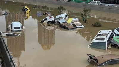 Cars sit in floodwaters after heavy rains hit the city of Zhengzhou in China's central Henan province. (AFP) Cars sit in floodwaters after heavy rains hit the city of Zhengzhou in China's central Henan province. (AFP)