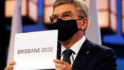 President of the International Olympic Committee Thomas Bach announces Brisbane as the 2032 Summer Olympics host city during the 138th IOC Session at Hotel Okura on July 21, 2021 in Tokyo, Japan. (Getty Images) President of the International Olympic Committee Thomas Bach announces Brisbane as the 2032 Summer Olympics host city during the 138th IOC Session at Hotel Okura on July 21, 2021 in Tokyo, Japan. (Getty Images)