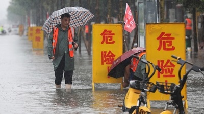 "Some rivers have exceeded monitoring levels, some dams have broken down, while some railway services have stopped and flights cancelled, causing heavy casualties and property losses," President Xi Jinping said on Wednesday, addressing the situation in a statement broadcast by state television. "Flood prevention efforts have become very difficult," Xi added. Here are a few visuals of the flooded streets of China. (AP) "Some rivers have exceeded monitoring levels, some dams have broken down, while some railway services have stopped and flights cancelled, causing heavy casualties and property losses," President Xi Jinping said on Wednesday, addressing the situation in a statement broadcast by state television. "Flood prevention efforts have become very difficult," Xi added. Here are a few visuals of the flooded streets of China. (AP)