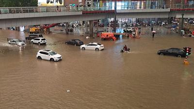 A flooded street following heavy rains in Zhengzhou in China’s central Henan province. (AFP) A flooded street following heavy rains in Zhengzhou in China’s central Henan province. (AFP)