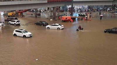 A flooded street following heavy rains in Zhengzhou in China’s central Henan province. (AFP) (HT_PRINT) A flooded street following heavy rains in Zhengzhou in China’s central Henan province. (AFP) (HT_PRINT)