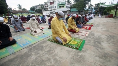 Men sit on the floor and offer namaz in Agartala. Muslims worldwide marked the Eid al-Adha holiday over the past days amid a global pandemic. (ANI) Men sit on the floor and offer namaz in Agartala. Muslims worldwide marked the Eid al-Adha holiday over the past days amid a global pandemic. (ANI)