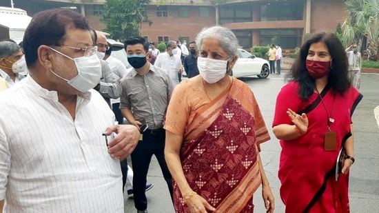 Union Finance Minister Nirmala Sitharaman with others arrives to attend the all BJP MP party meeting at Parliament, in New Delhi on Tuesday. (ANI Photo)