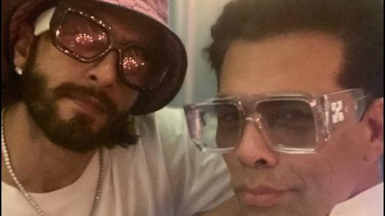 Karan Johar took to Instagram to share a picture with Ranveer Singh from his visit to the city.