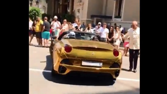 The image is taken from the video of the ‘gold Ferrari’ shared by Anand Mahindra.(Screengrab)