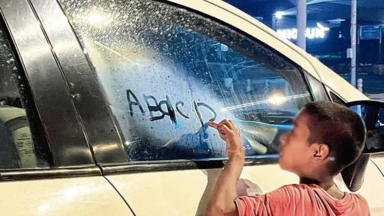 A child appears on the road, as if out of thin air, and walks towards the driver’s window. A child appears on the road, as if out of thin air, and walks towards the driver’s window.