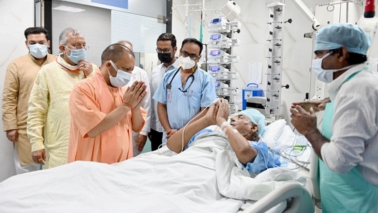 UP Chief Minister Yogi Adityanath visits former chief minister Kalyan Singh at SGPGI in Lucknow. (PTI) UP Chief Minister Yogi Adityanath visits former chief minister Kalyan Singh at SGPGI in Lucknow. (PTI)